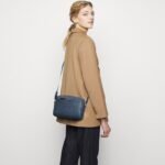 Nola Keep Your Essentials Organized with a Triple Zip Cell Phone Leather Handbag - Image 74